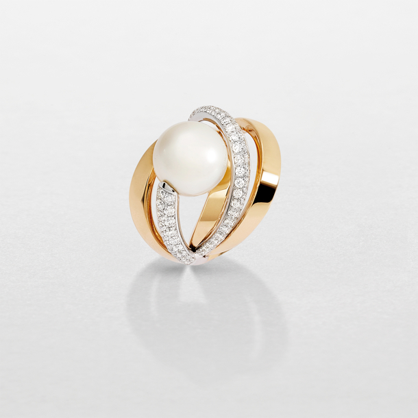 white and pink gold with diamonds and pearl ring