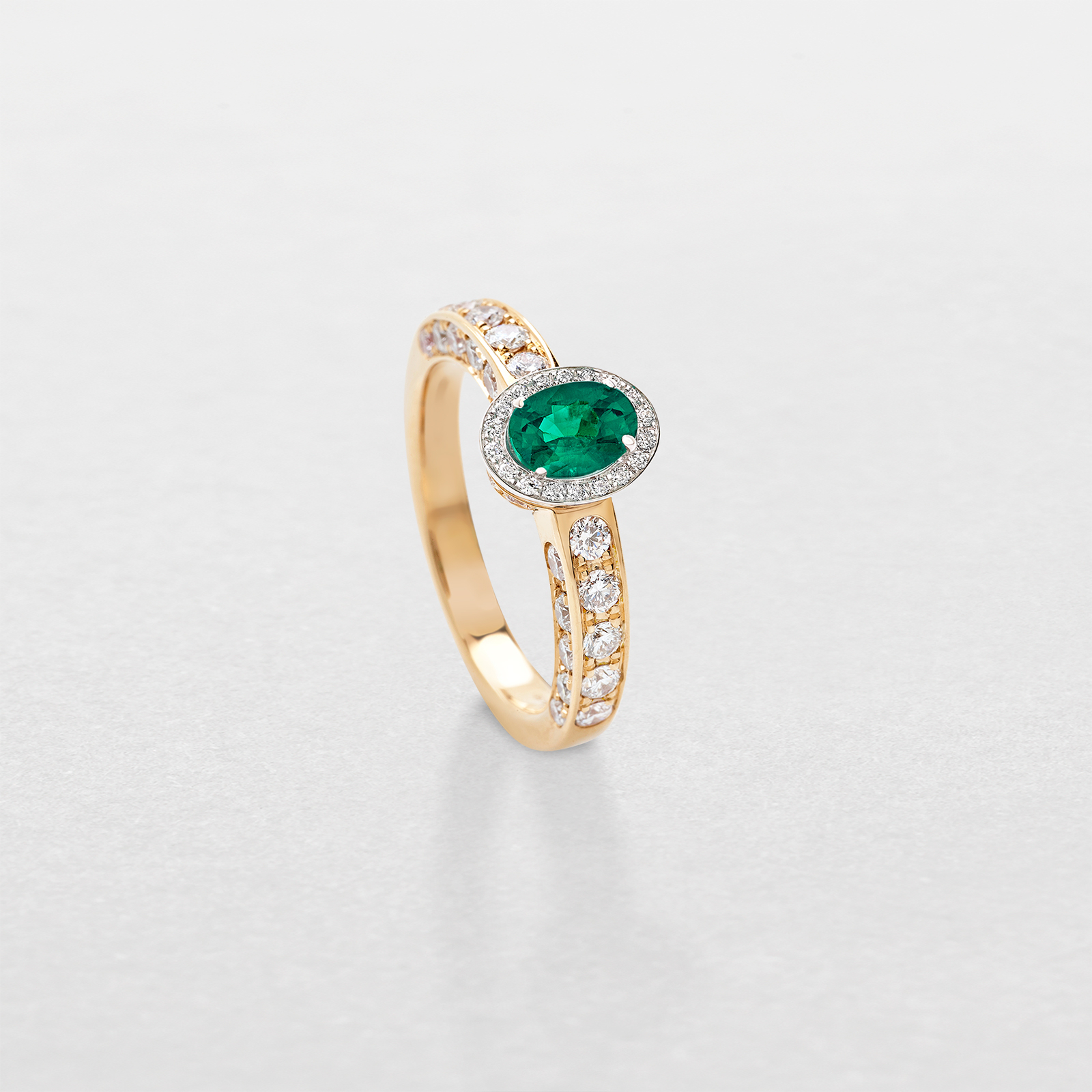 white and pink gold with diamonds and emerald ring