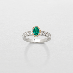 white and pink gold with diamonds and emerald ring