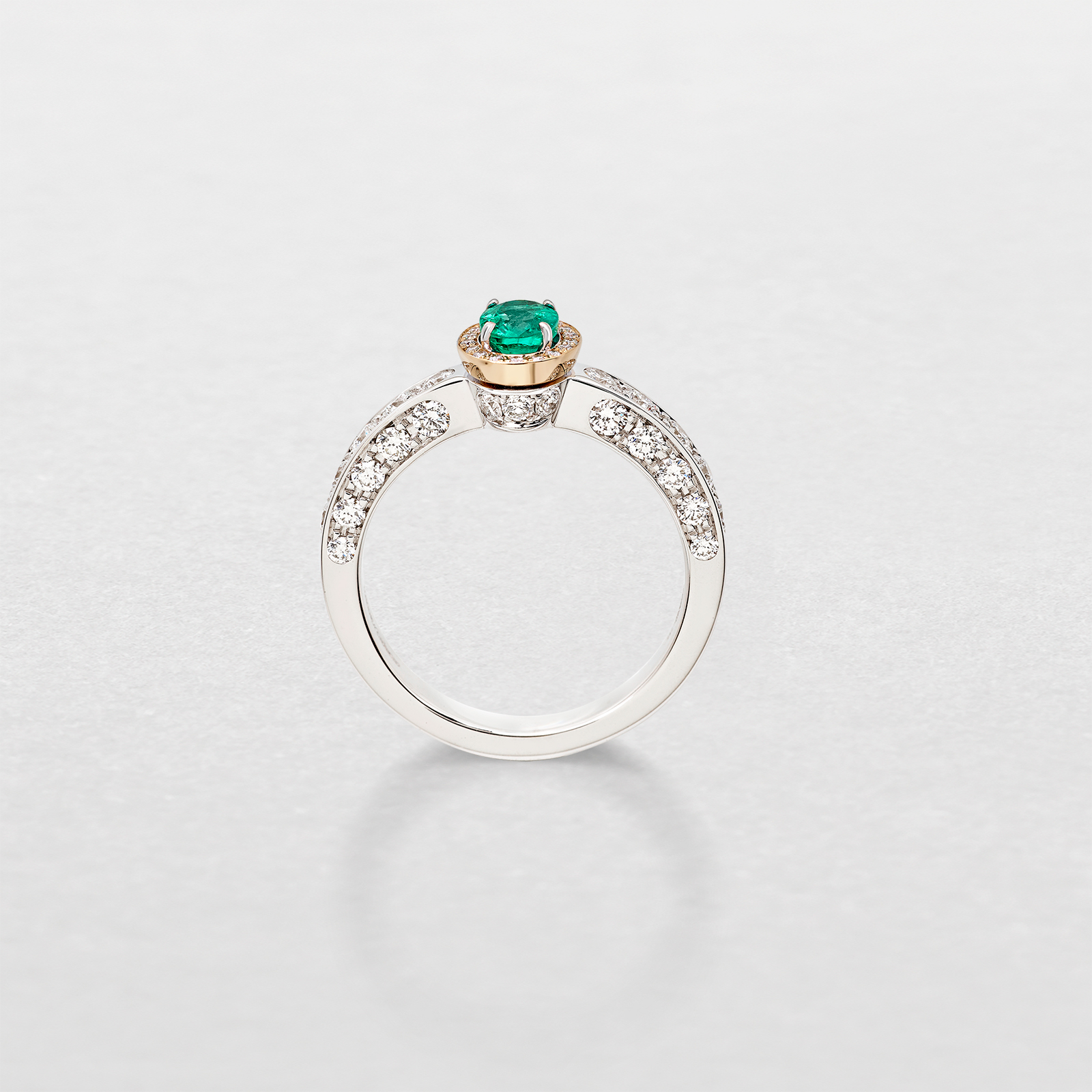 white and pink gold with diamonds and emerald ring
