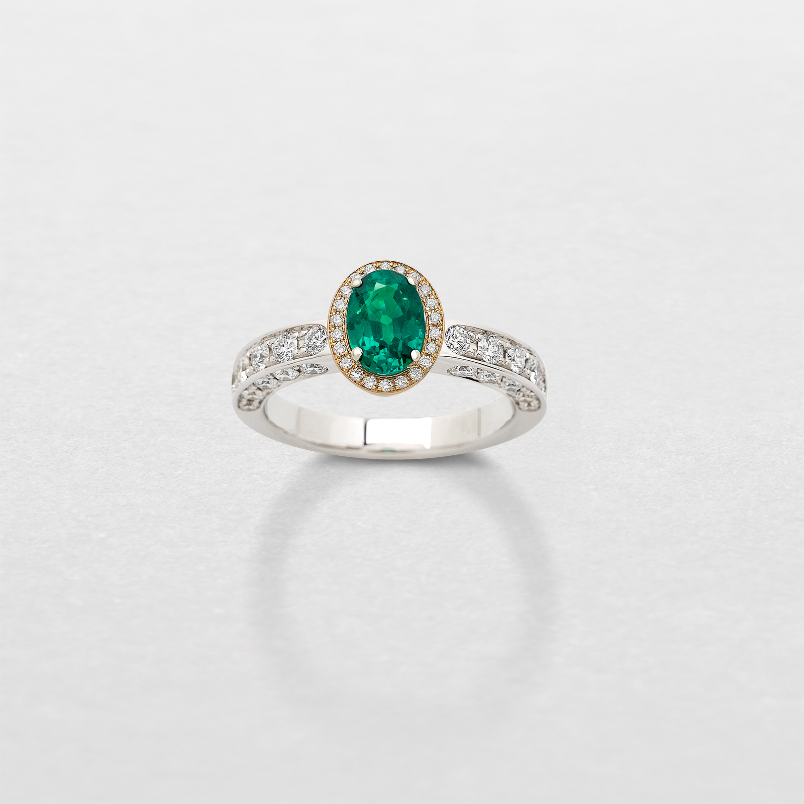 white and pink gold with diamonds and emerald ring