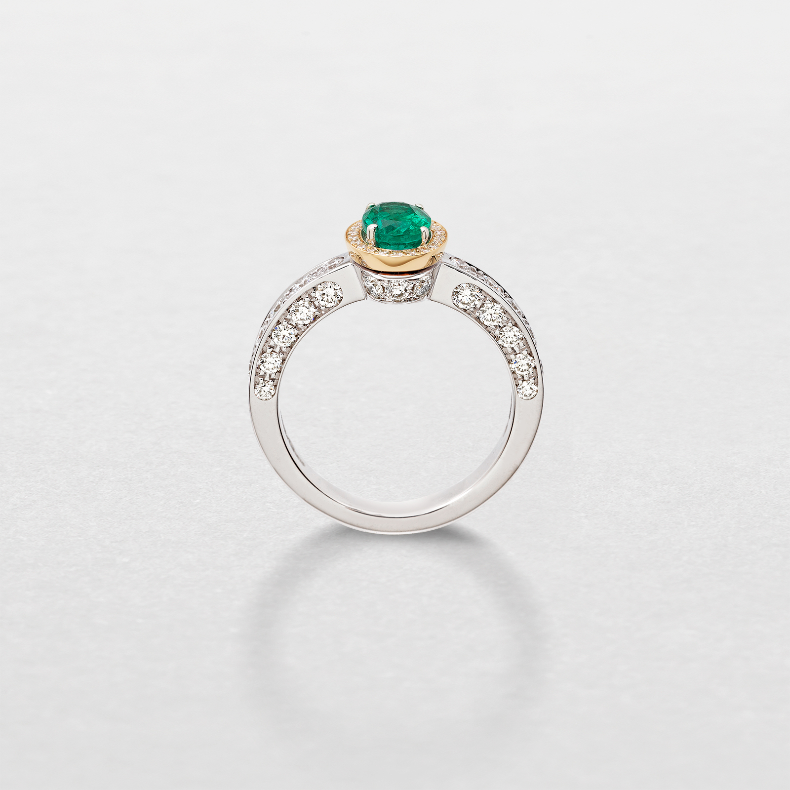 white and pink gold with diamonds and emerald ring