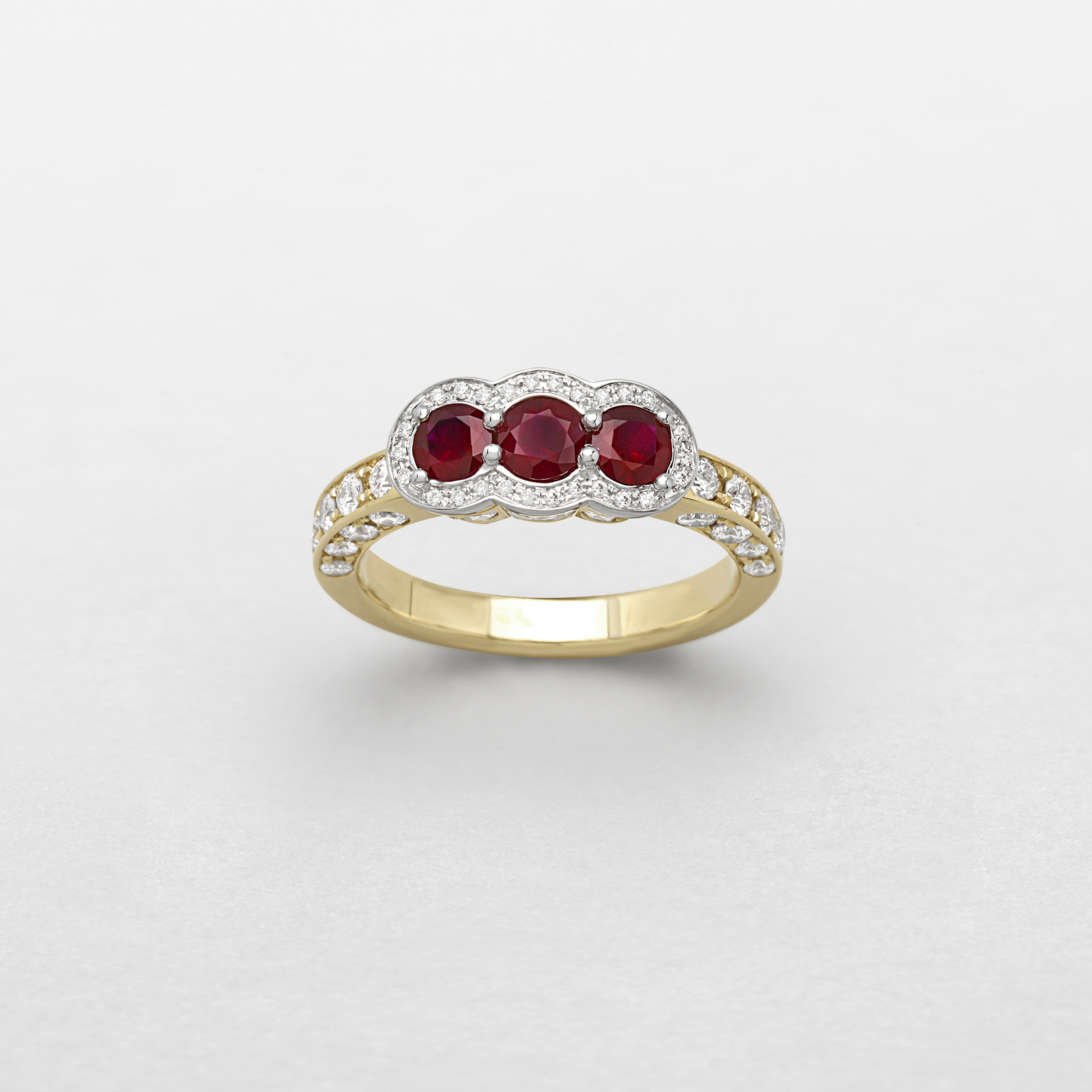 white and pink gold with diamonds and rubies ring