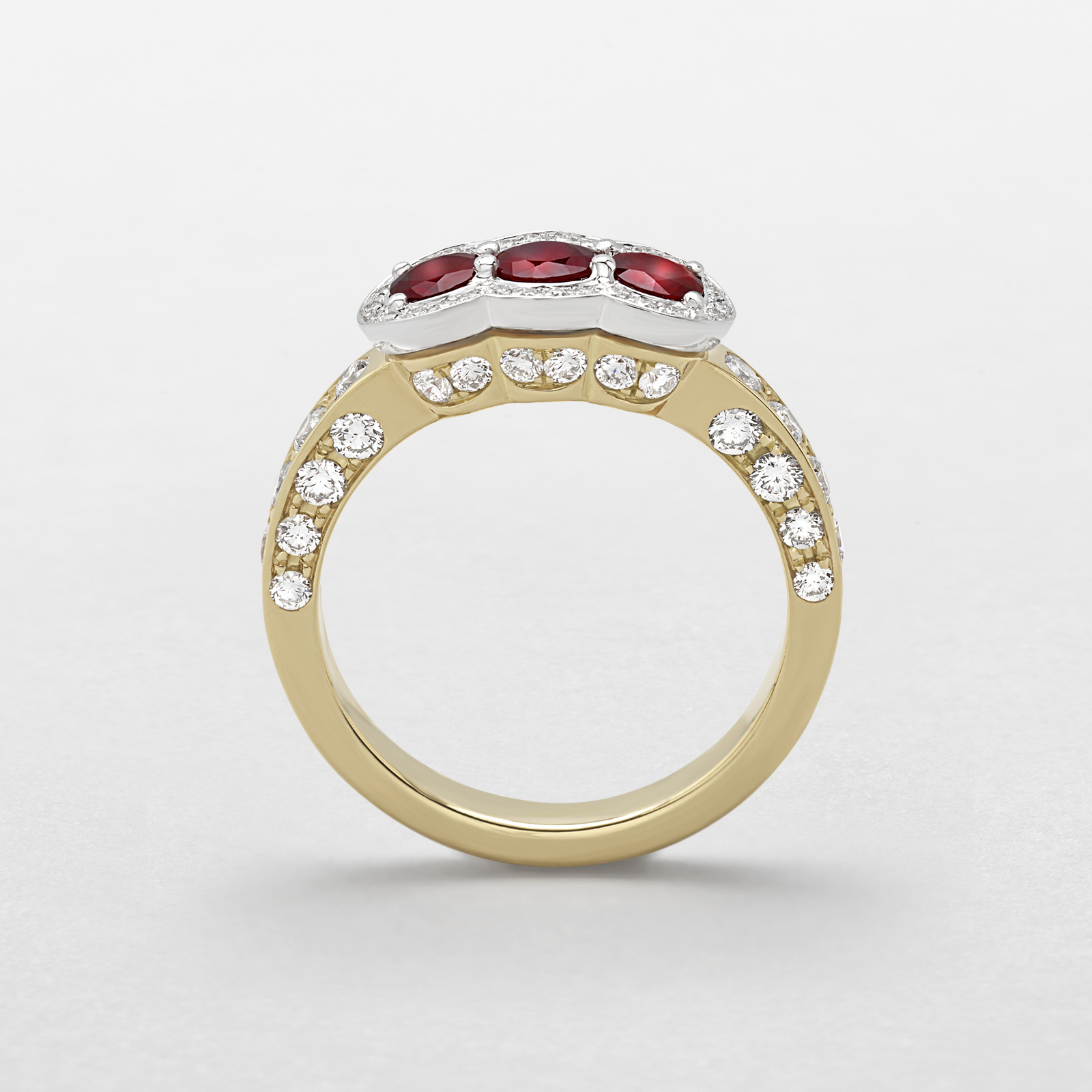 white and pink gold with diamonds and rubies ring