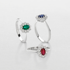 white gold with diamonds and precious color stones ring