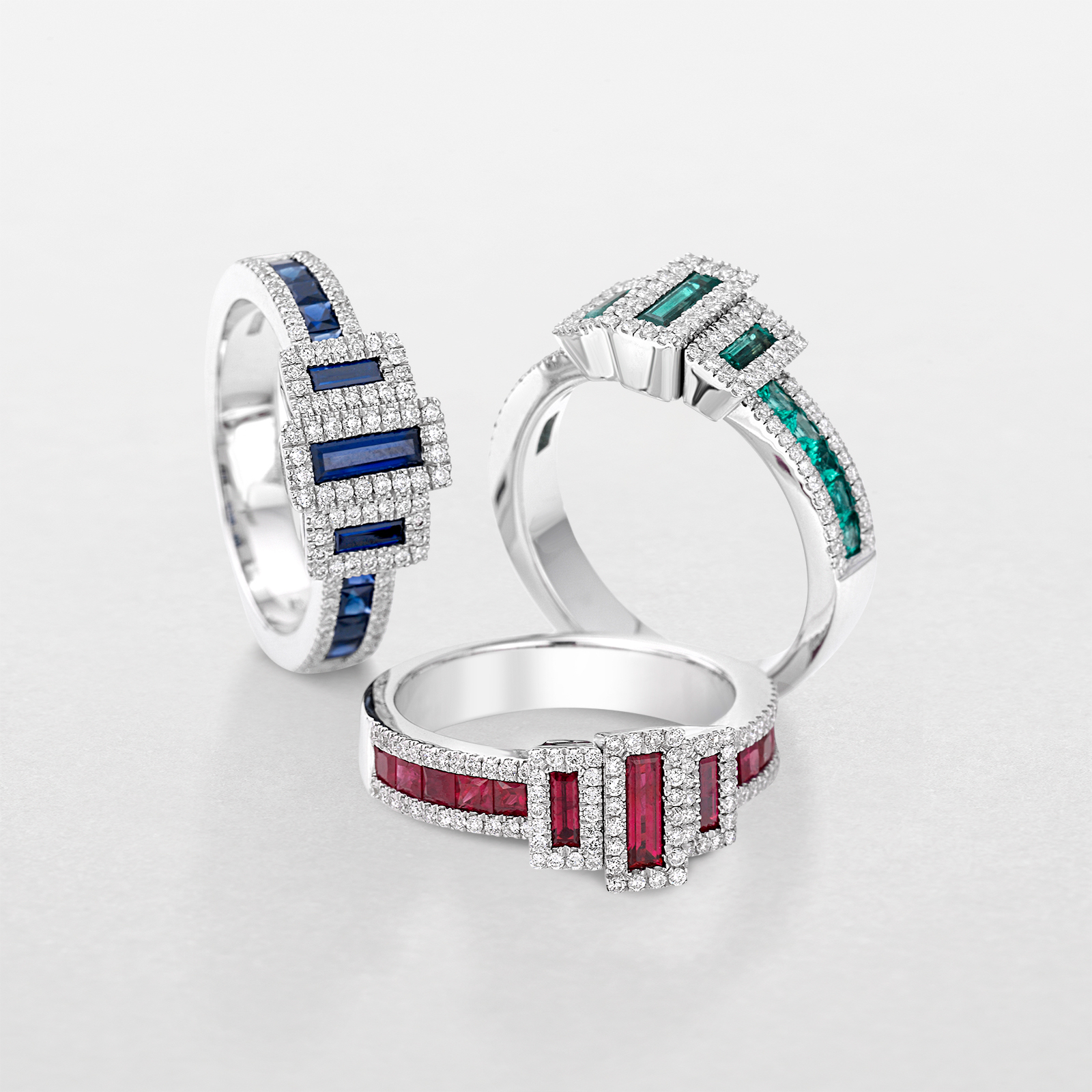 white gold with diamonds and precious color stones ring