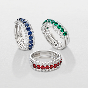 white gold with diamonds and precious color stones ring