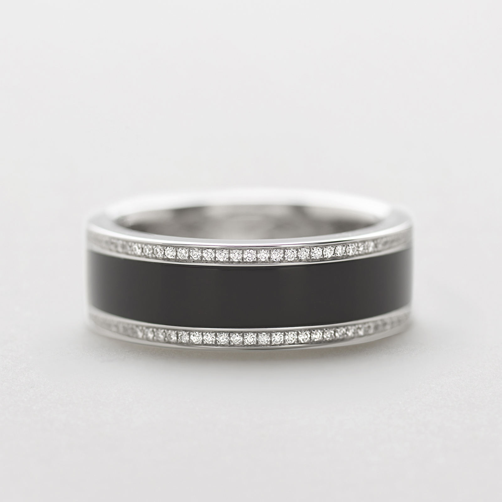 white gold with diamonds and onix ring