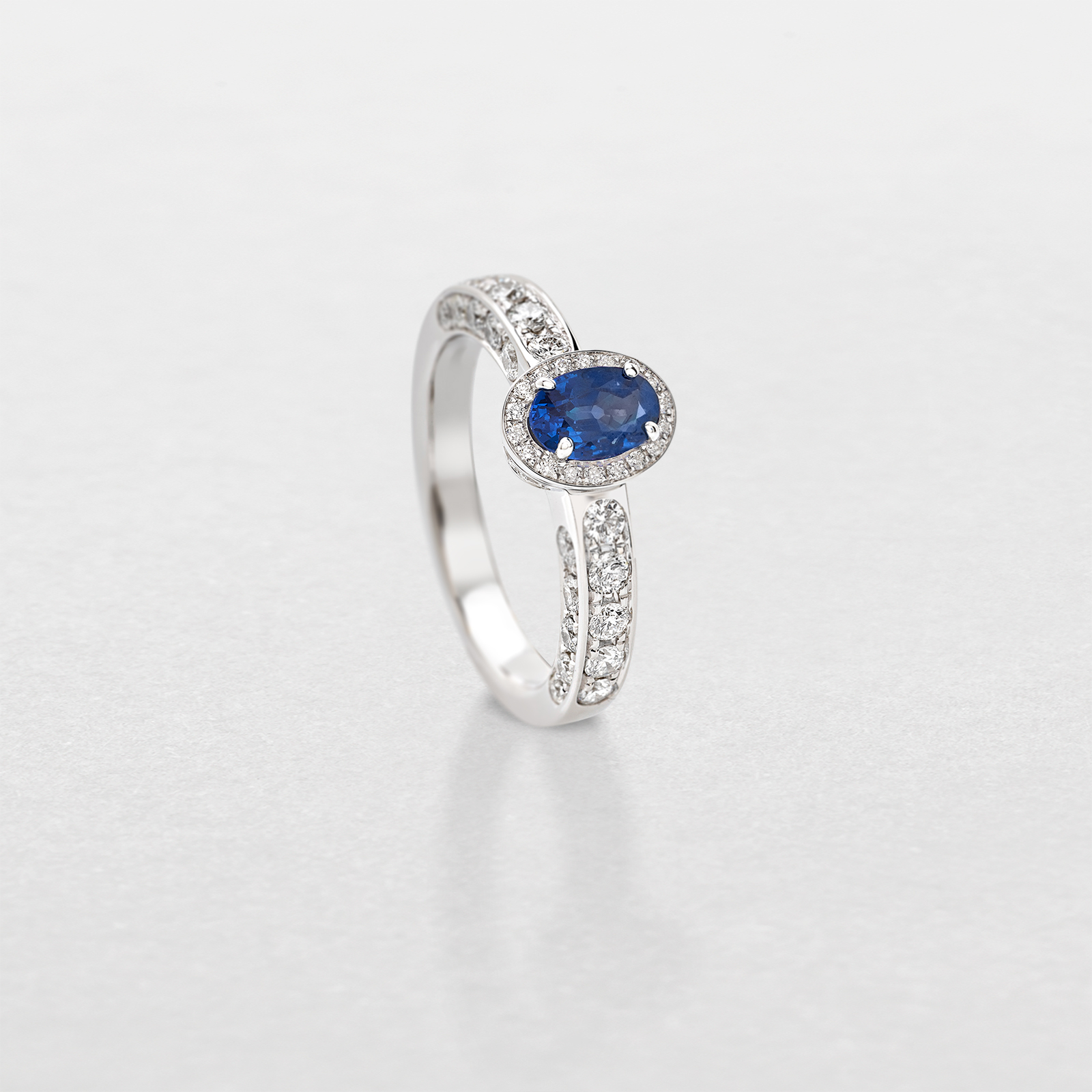 white gold with diamonds and sapphire ring