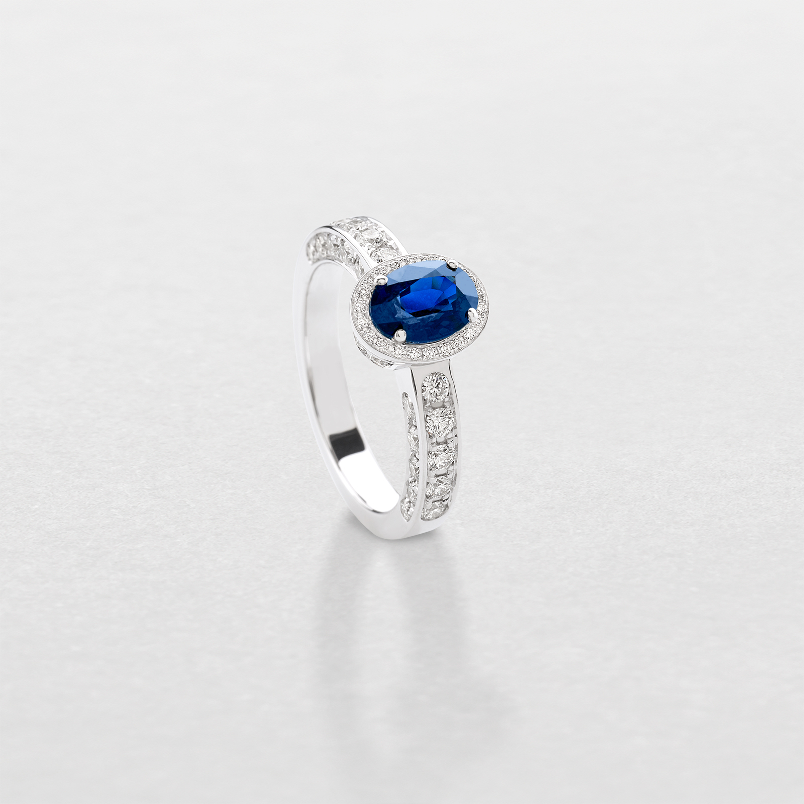 white gold with diamonds and sapphire ring