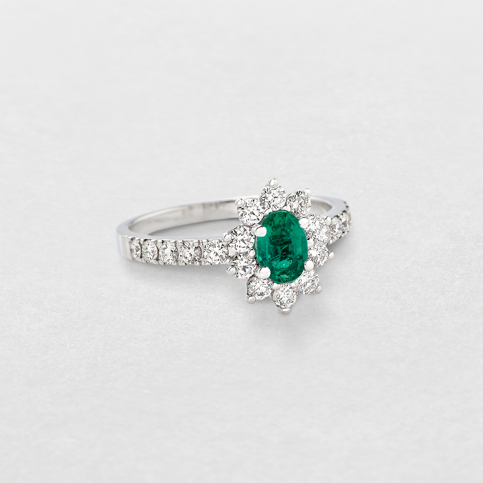 white gold with diamonds and emerald ring