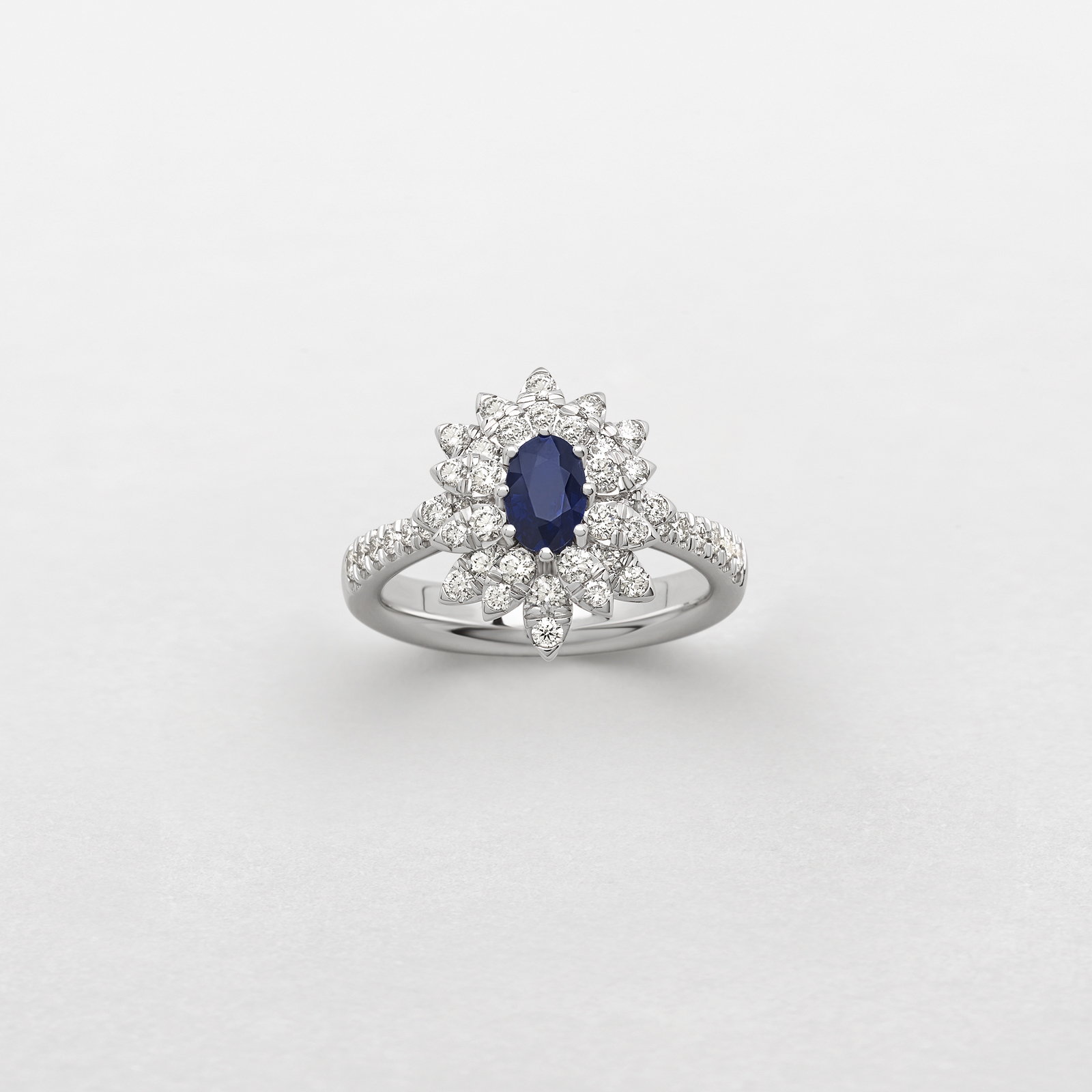 white gold with diamonds and sapphire ring