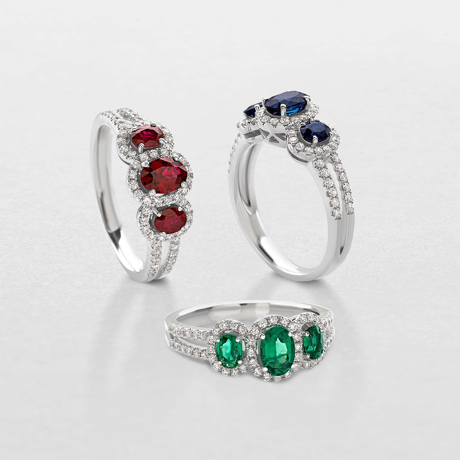 white gold with diamonds and precious color stones ring