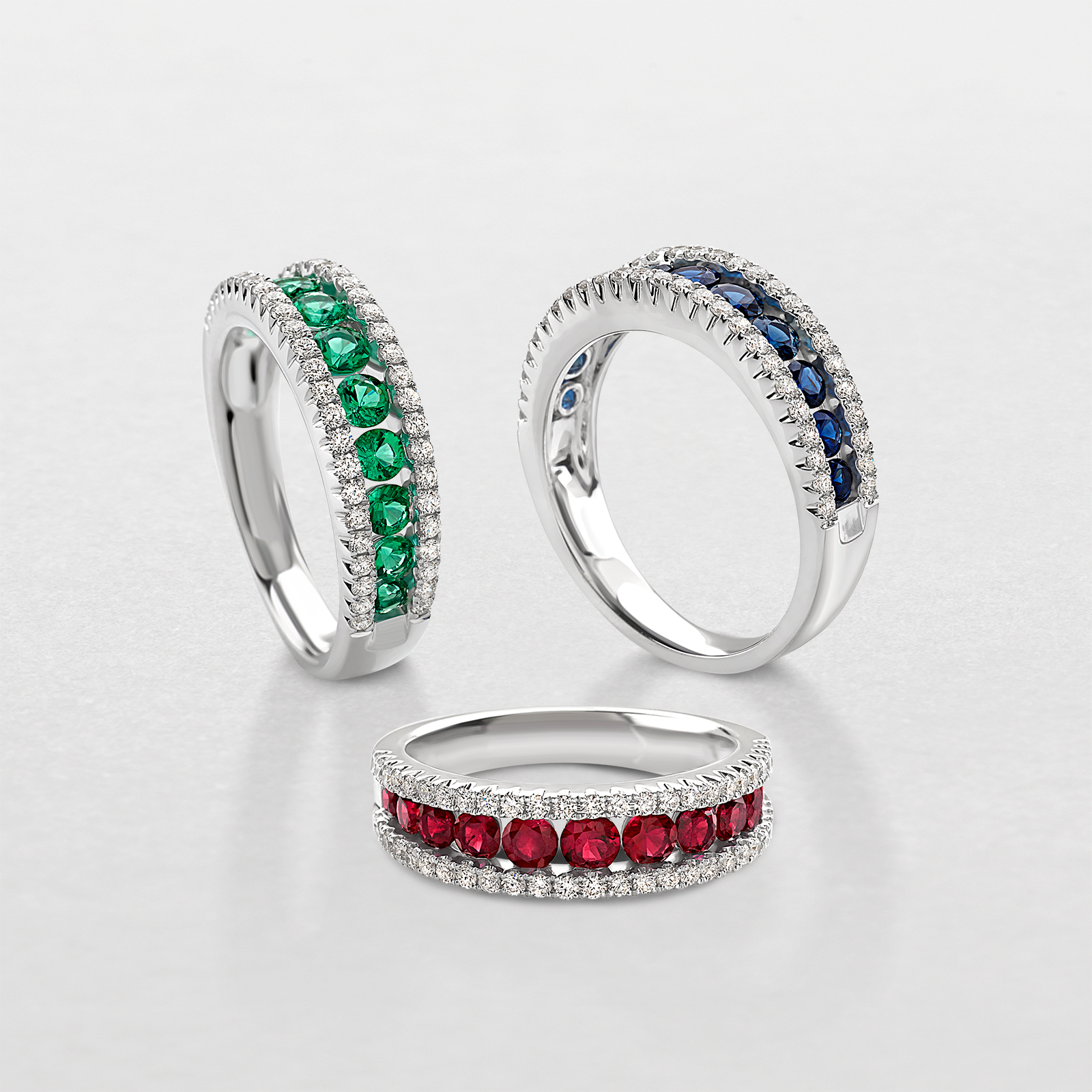 white gold with diamonds and precious color stones ring