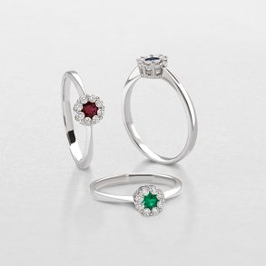 white gold with diamonds and precious color stones ring