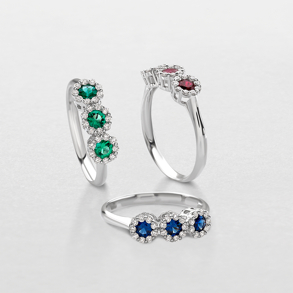white gold with diamonds and precious color stones ring