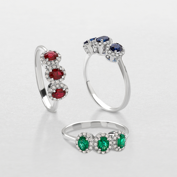 white gold with diamonds and precious color stones ring