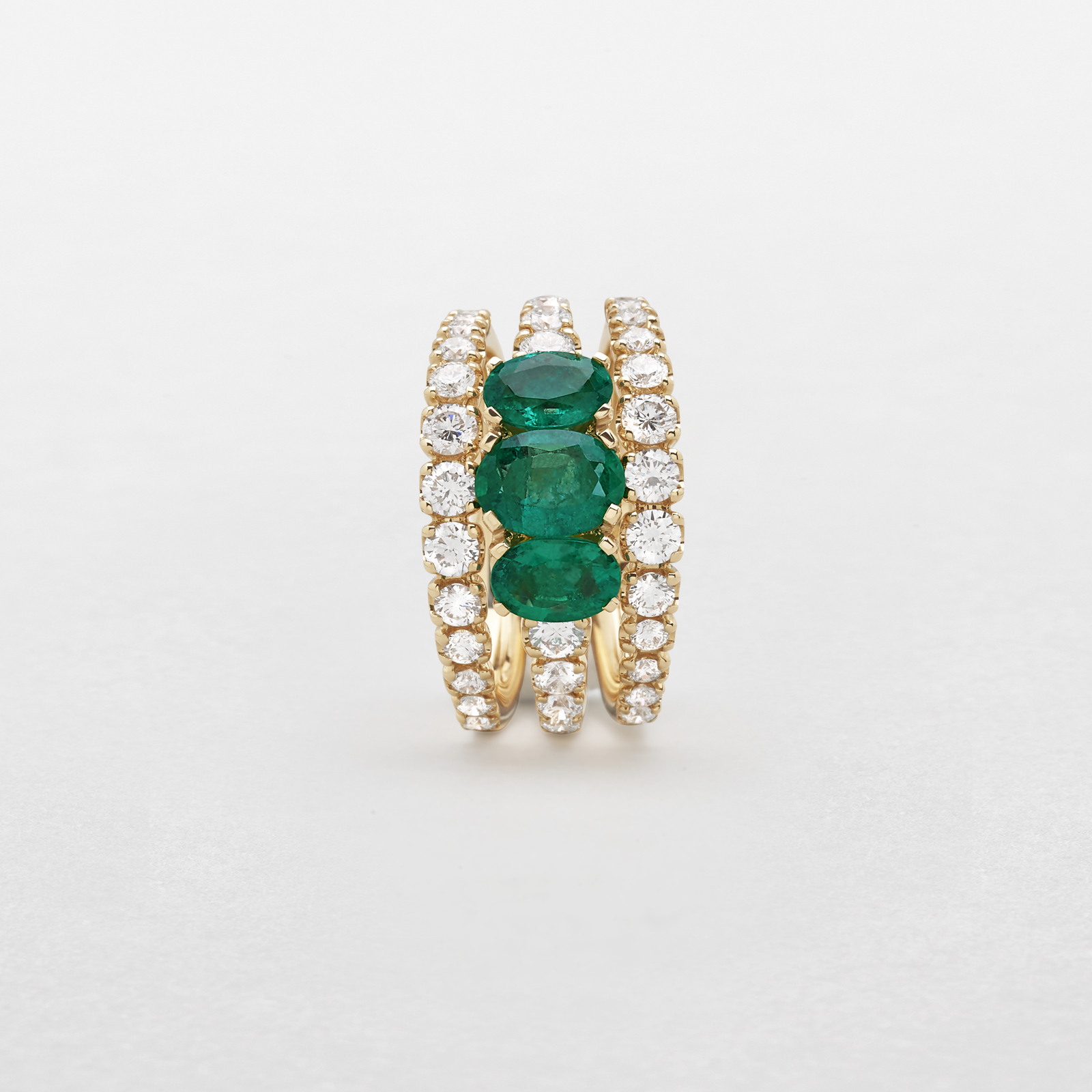 rose gold with diamonds and emeralds ring
