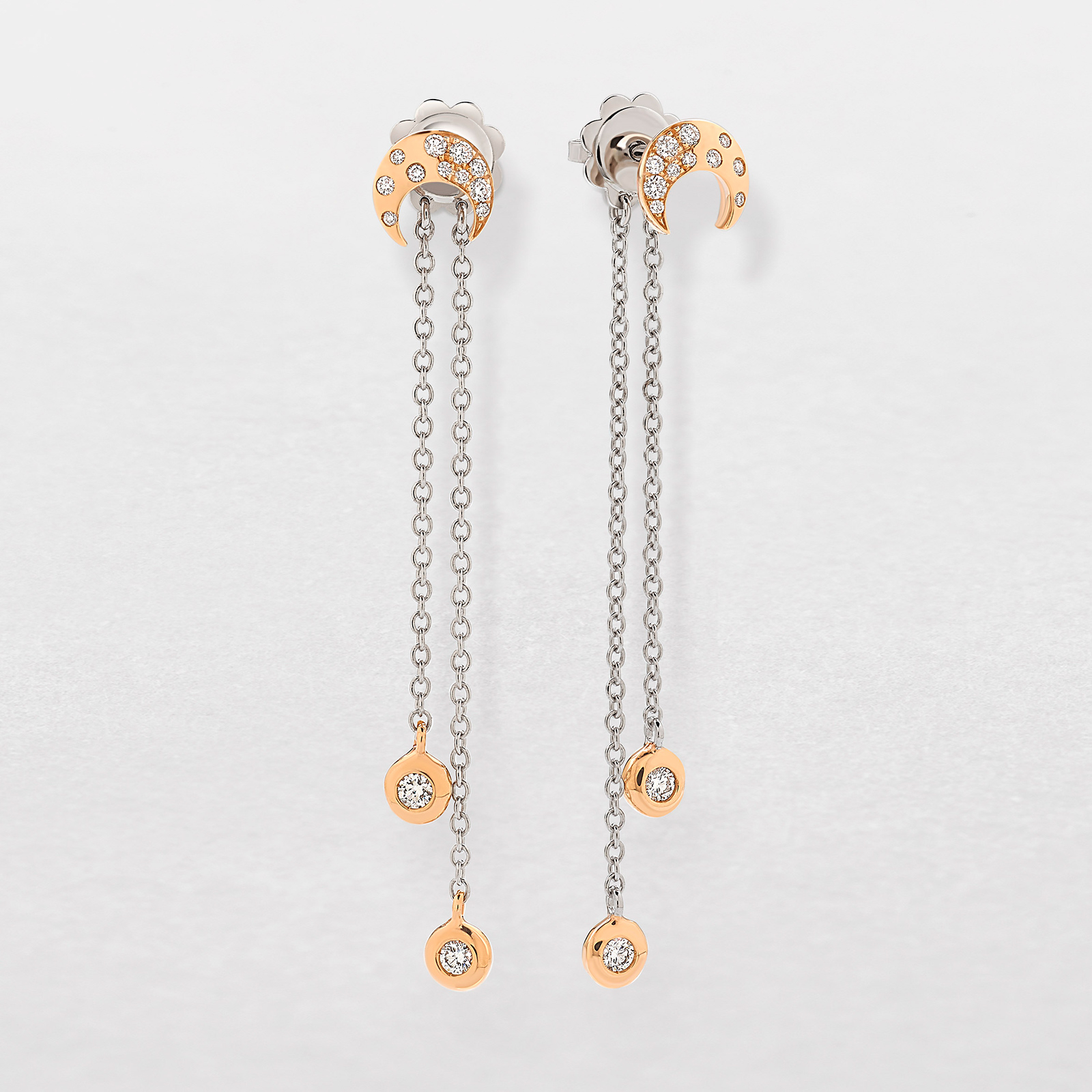 white and pink gold and diamonds earrings