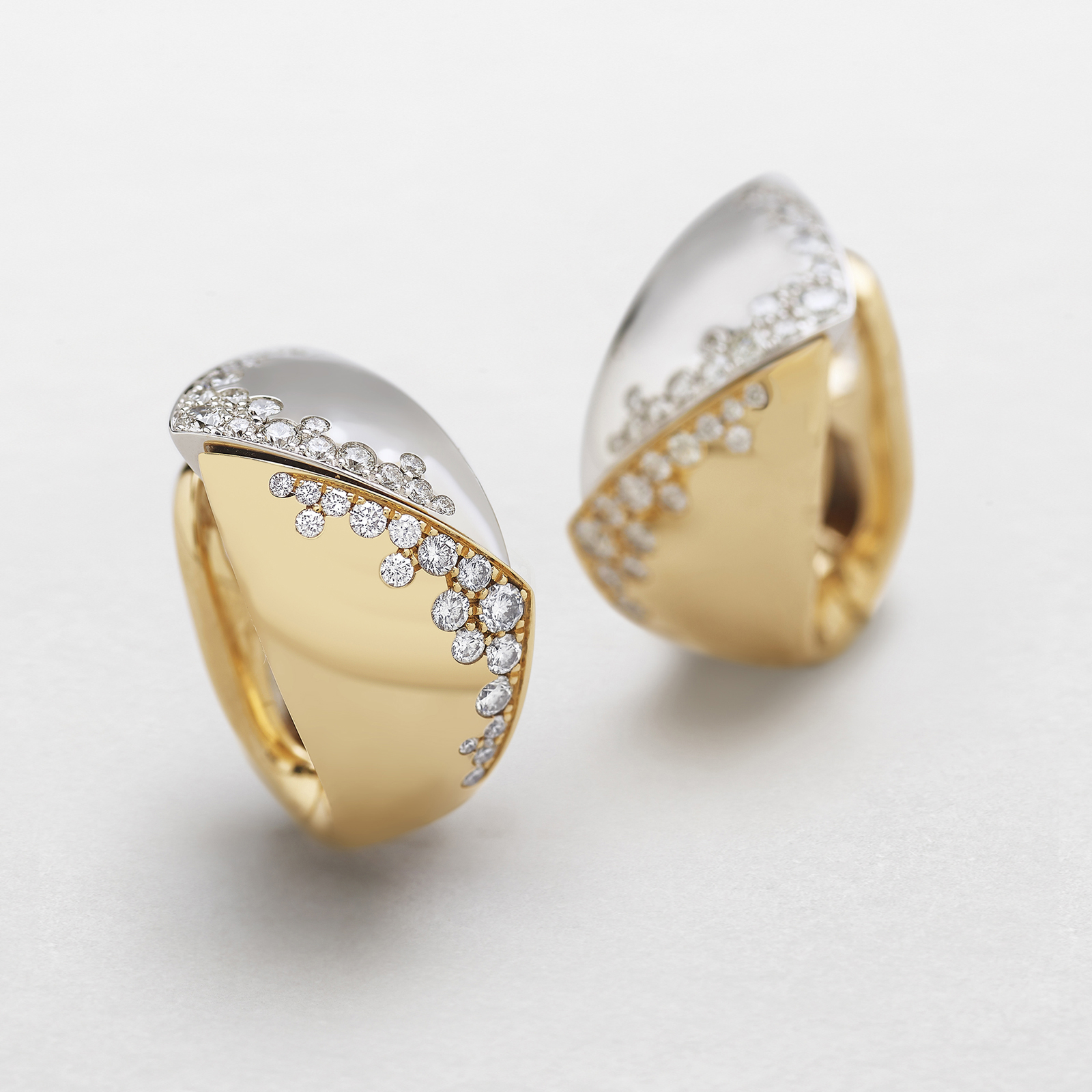 orecchini in oro rosa, bianco e diamanti