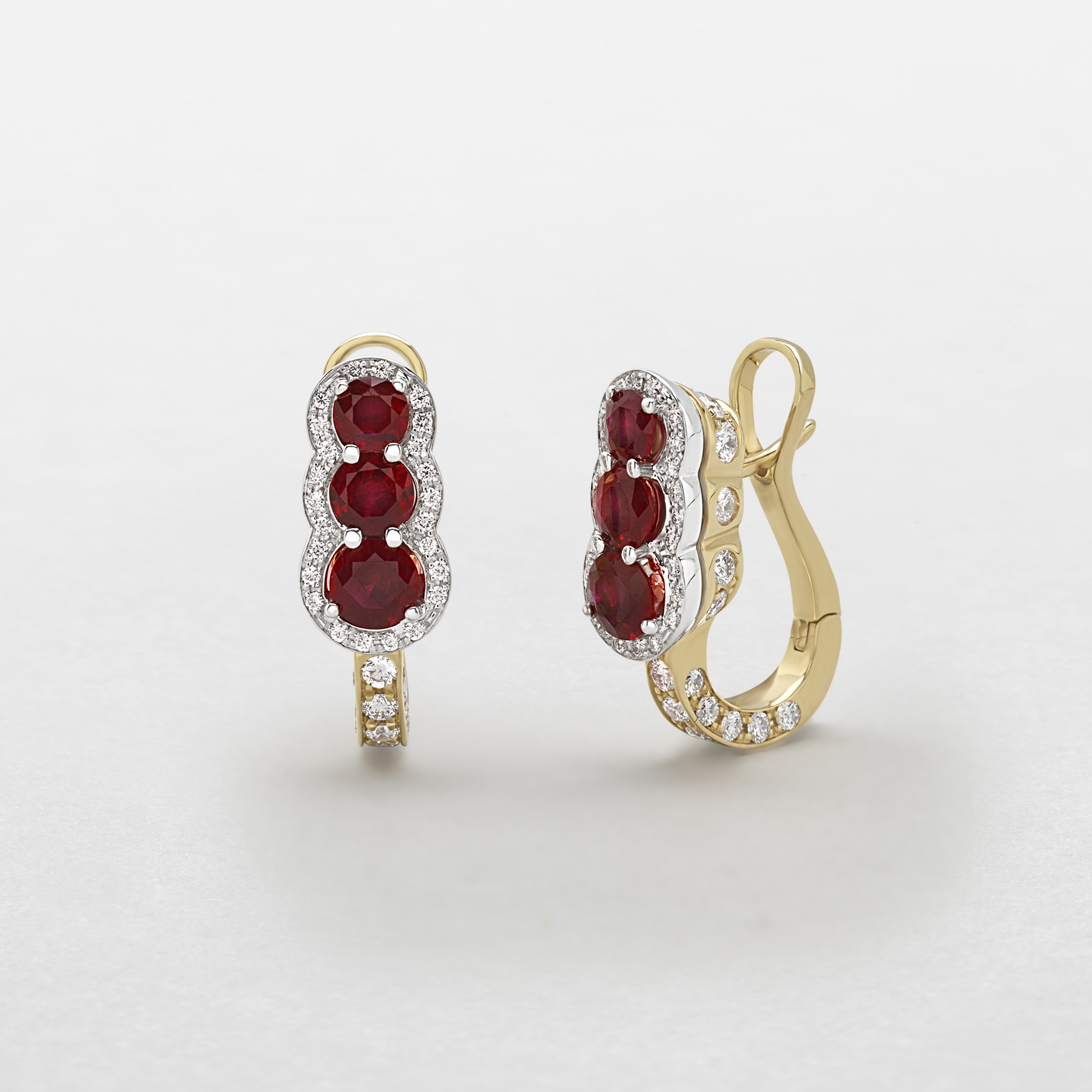 white and pink gold with diamonds and rubies earrings