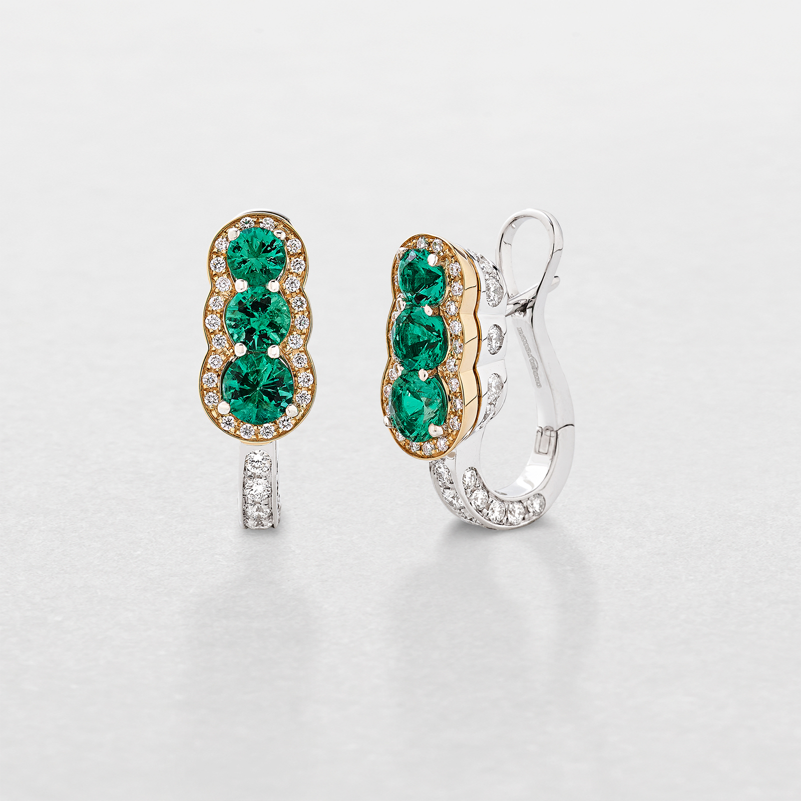 white and pink gold with diamonds and emeralds earrings