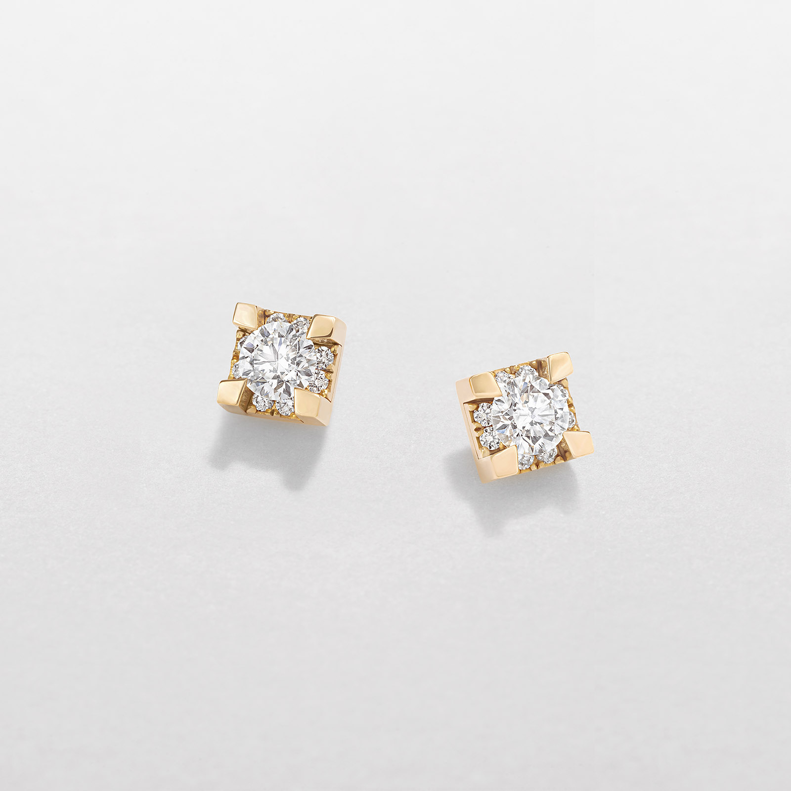 white and rose gold and diamonds earrings