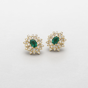white and rose gold with diamonds and emeralds earrings