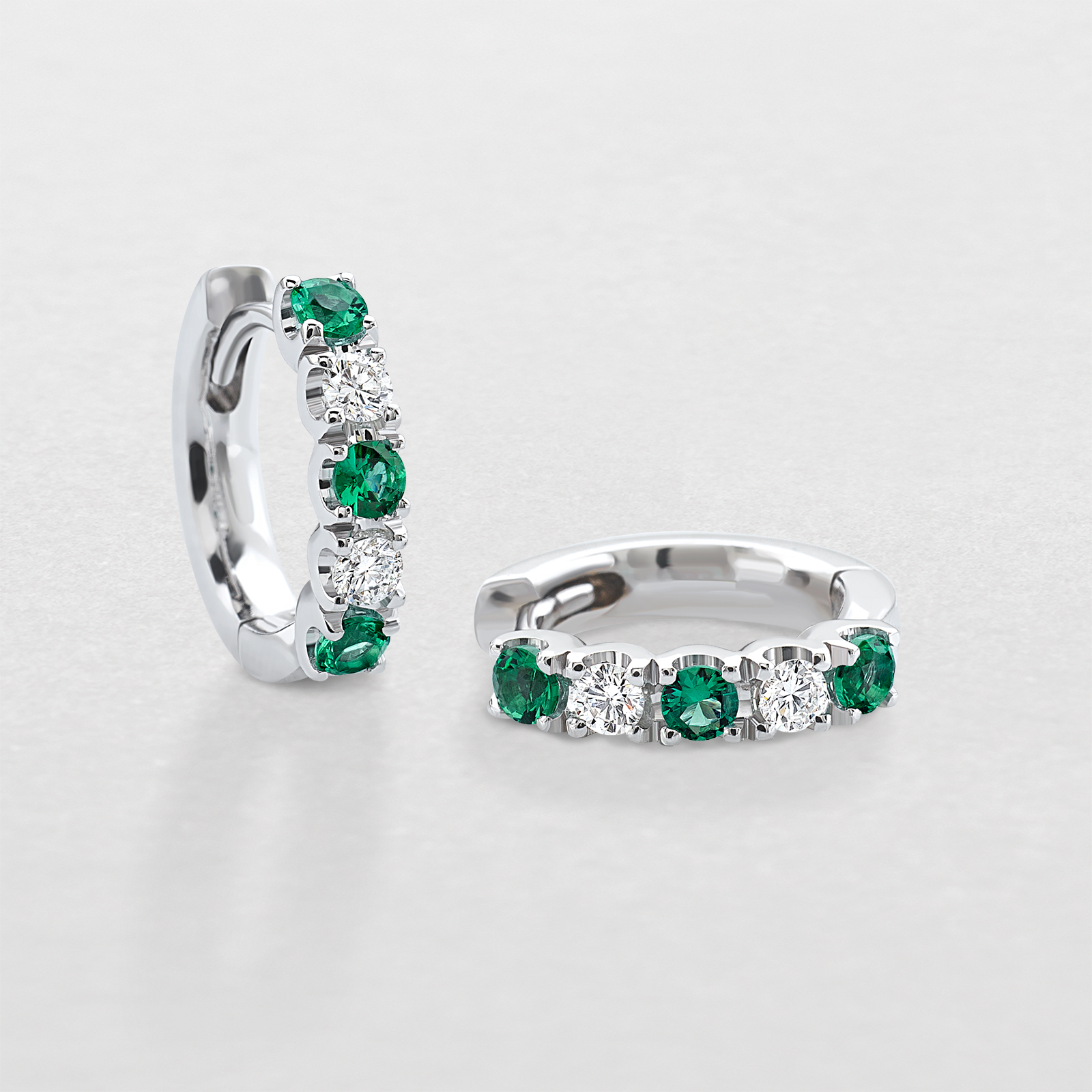 white gold with diamonds and emeralds earrings