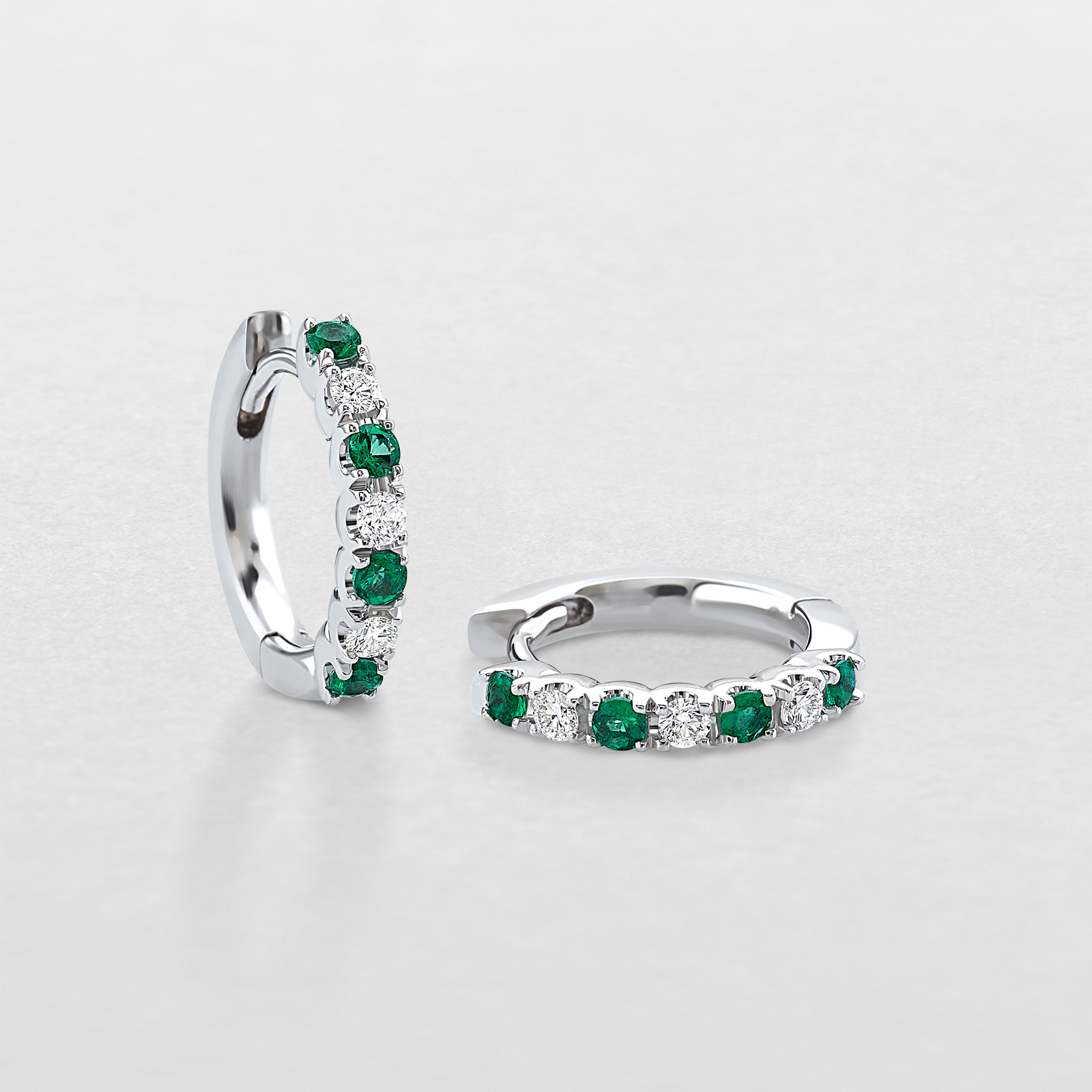 white gold with diamonds and emeralds earrings