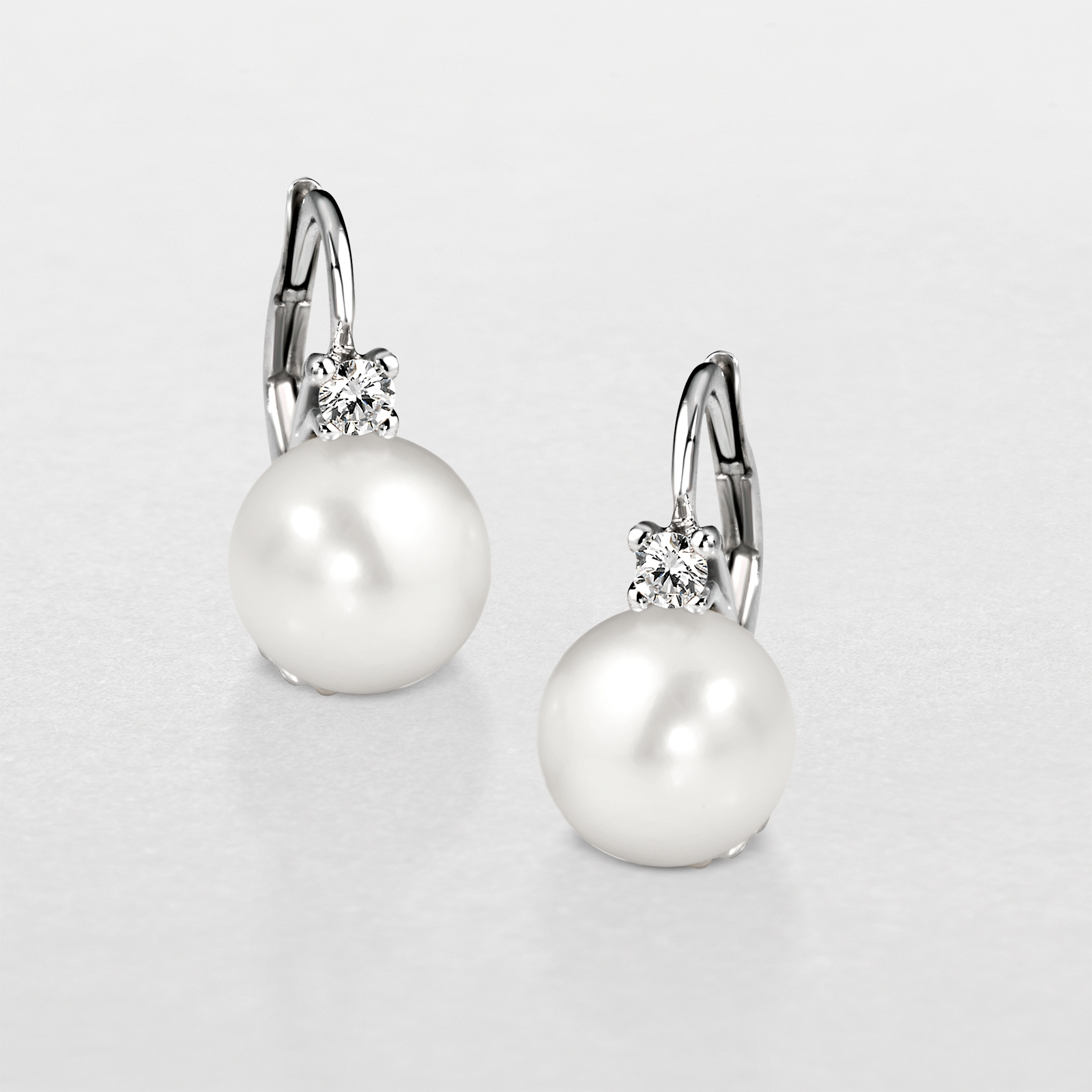 white gold with pearl and diamonds earrings