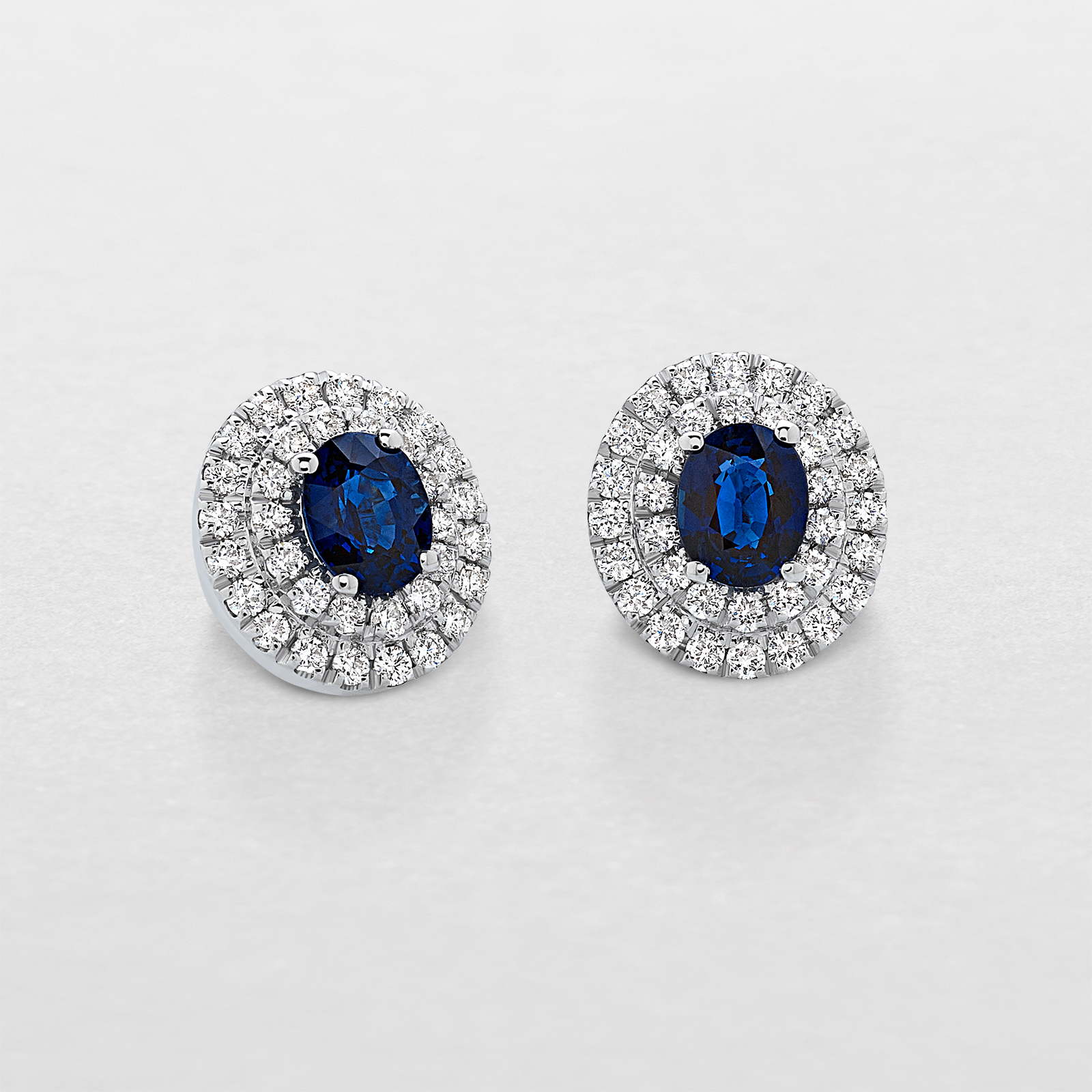 white gold with diamonds and sapphires earrings