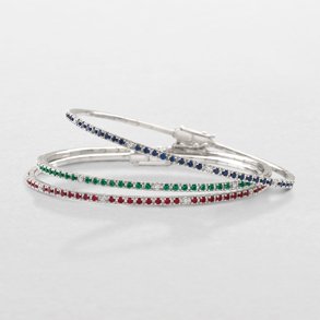 bracciali in oro bianco, diamanti e pietre di colore
