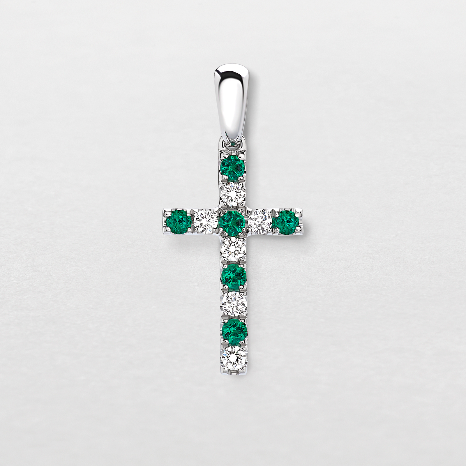 white gold with diamonds and emeralds pendant
