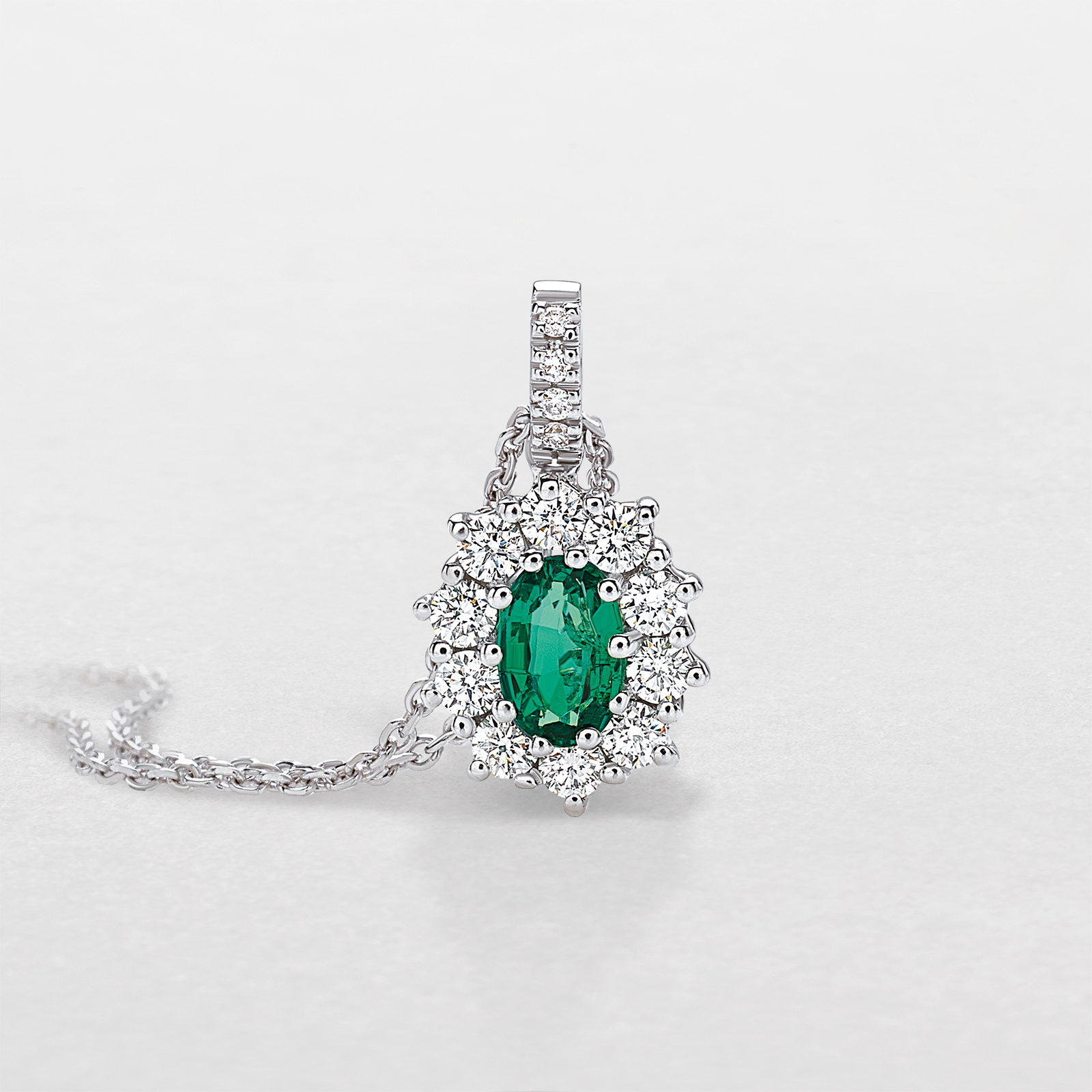 white gold with diamonds and emerald necklace
