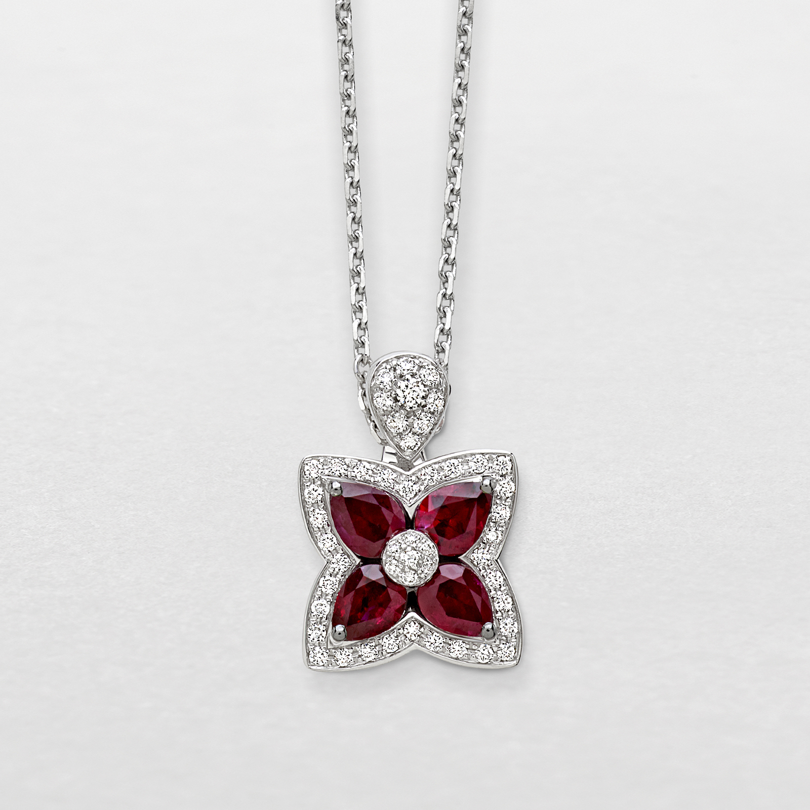 white gold with diamonds and rubies necklace