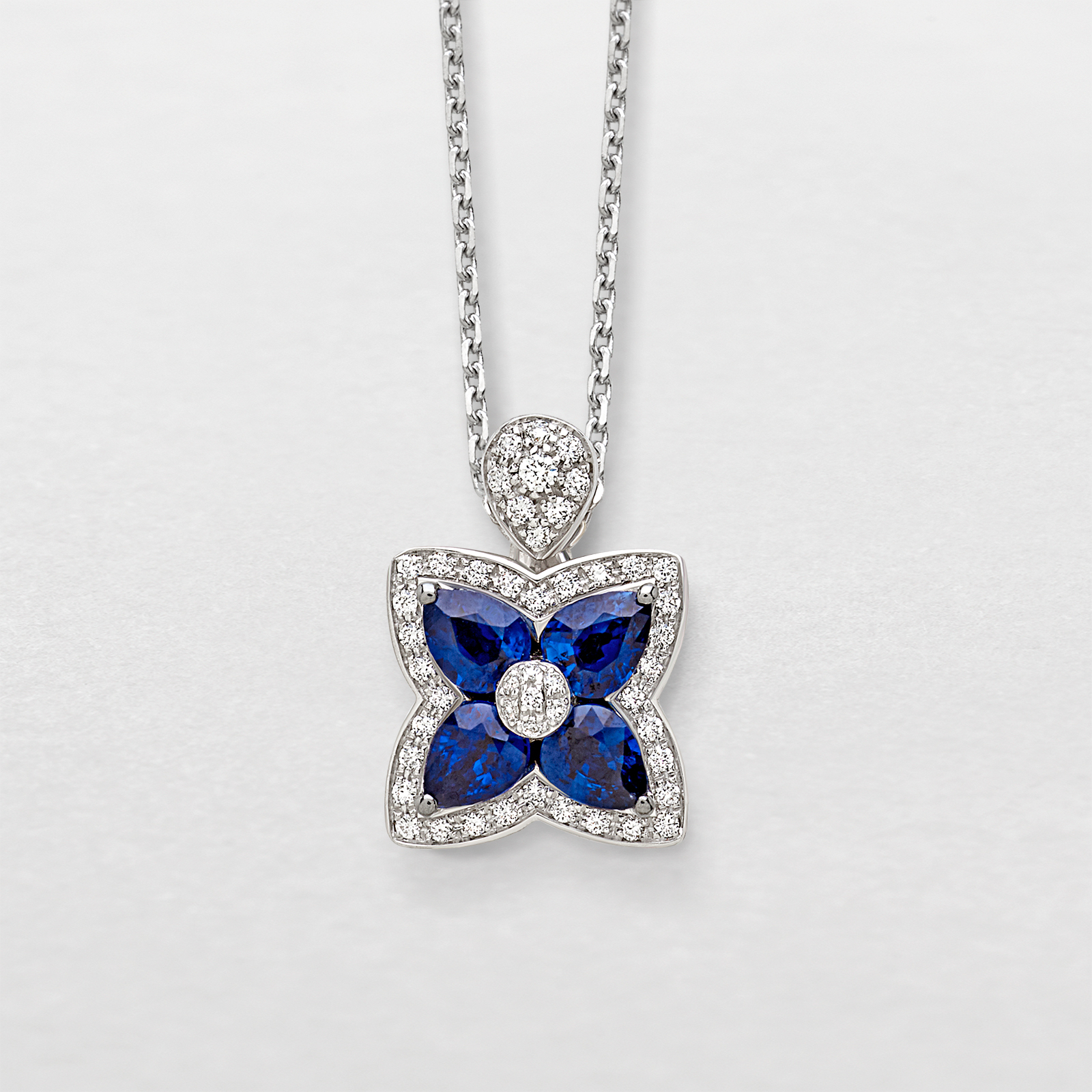 white gold with diamonds and sapphires necklace