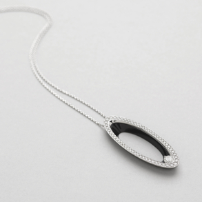 white gold with diamonds and onix necklace