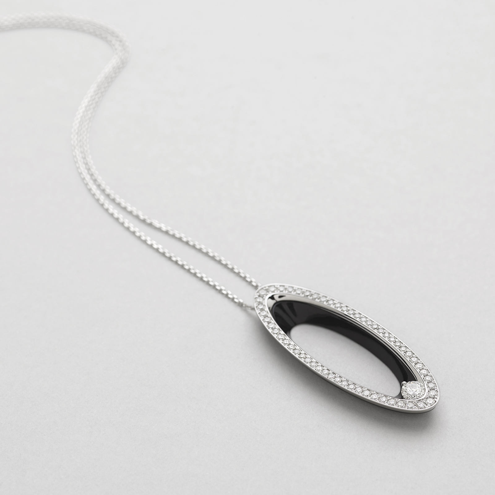 white gold with diamonds and onix necklace