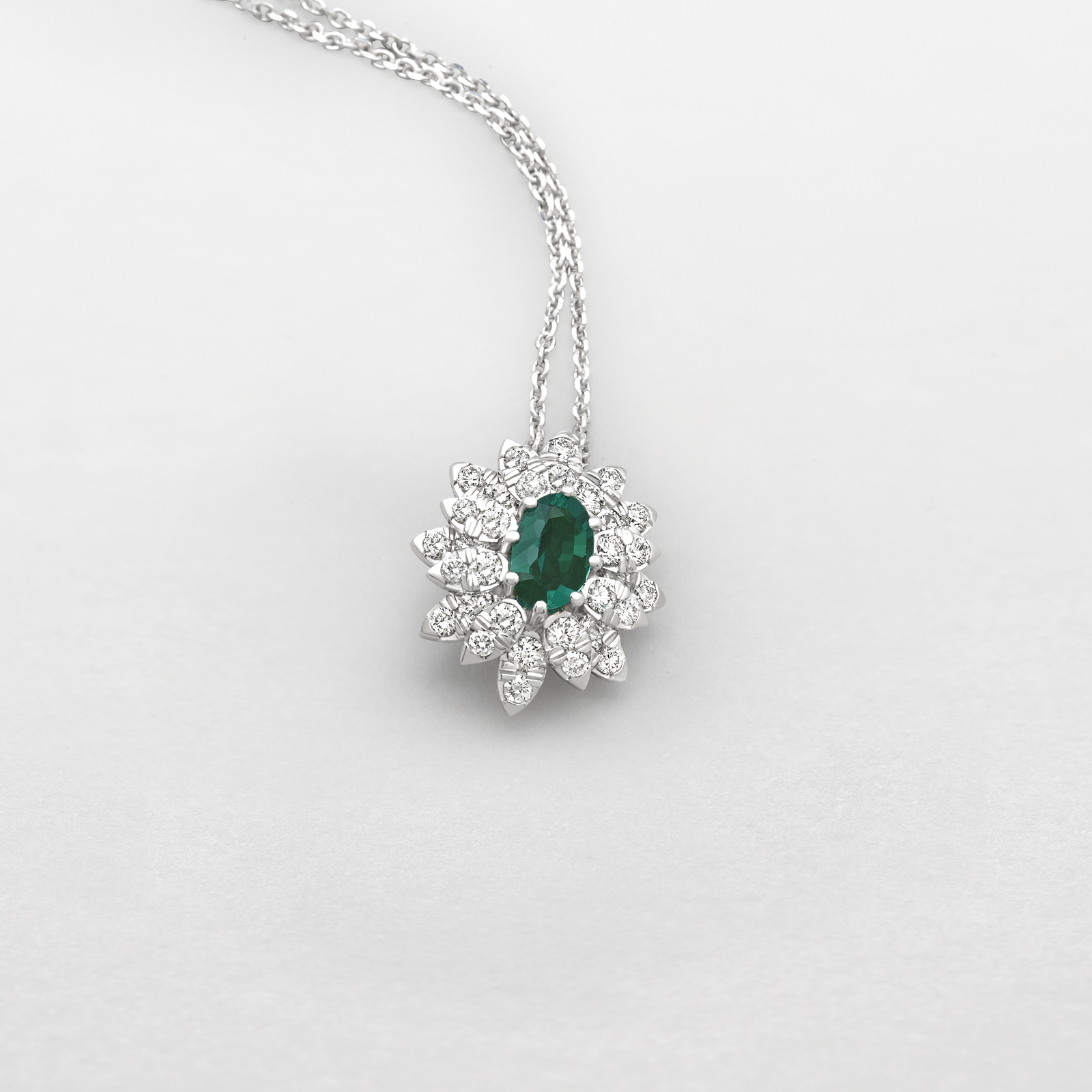 white gold with diamonds and emerald necklace