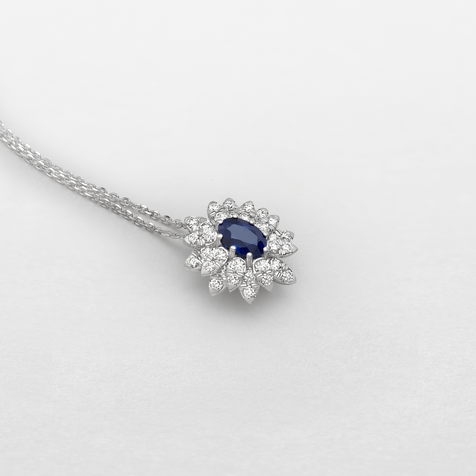 white gold with diamonds and sapphire necklace