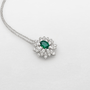 white gold with diamonds and emerald necklace