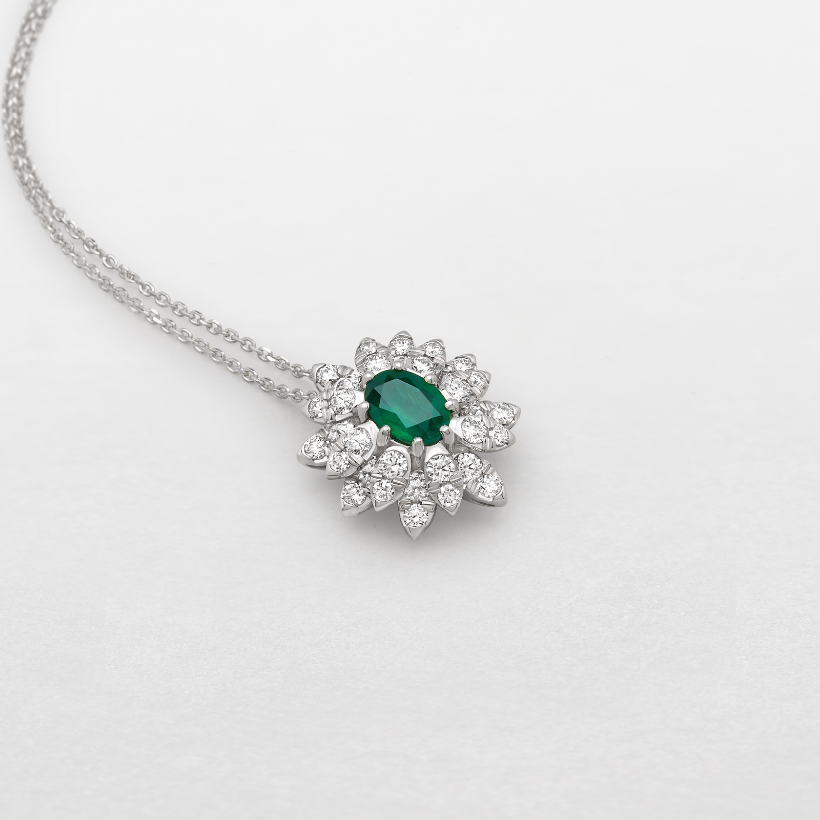 white gold with diamonds and emerald necklace