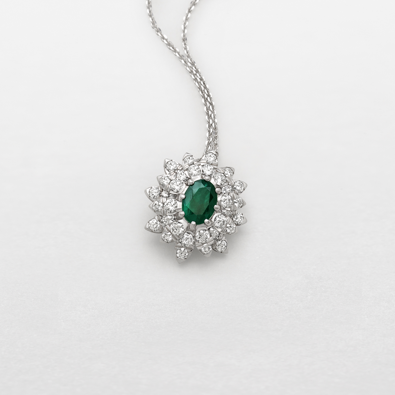 white gold with diamonds and emerald necklace