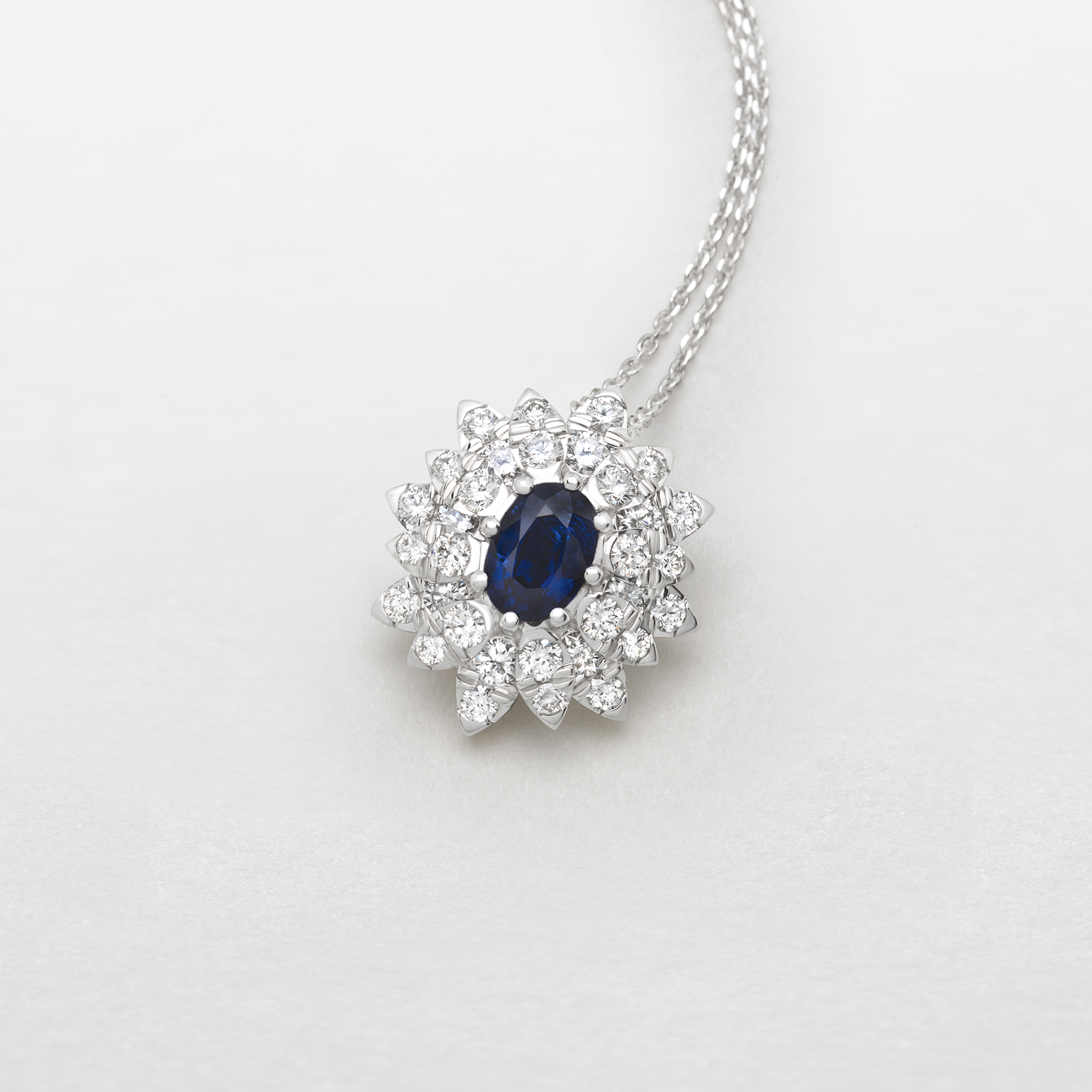 white gold with diamonds and sapphire necklace