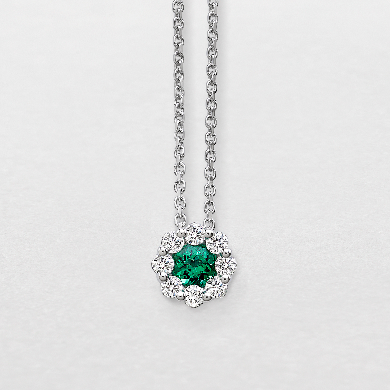 white gold with diamonds and emerald necklace