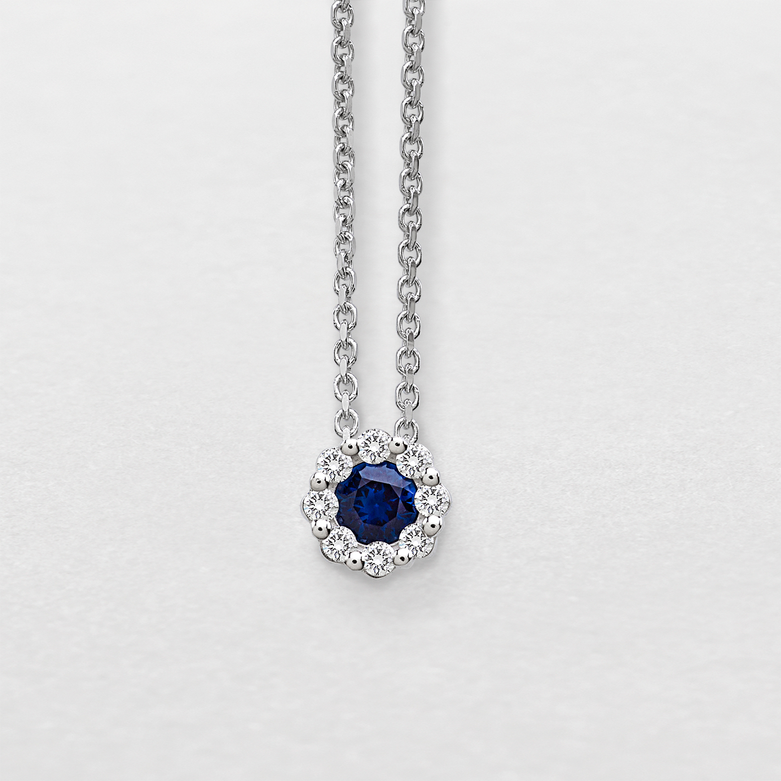 white gold with diamonds and sapphire necklace