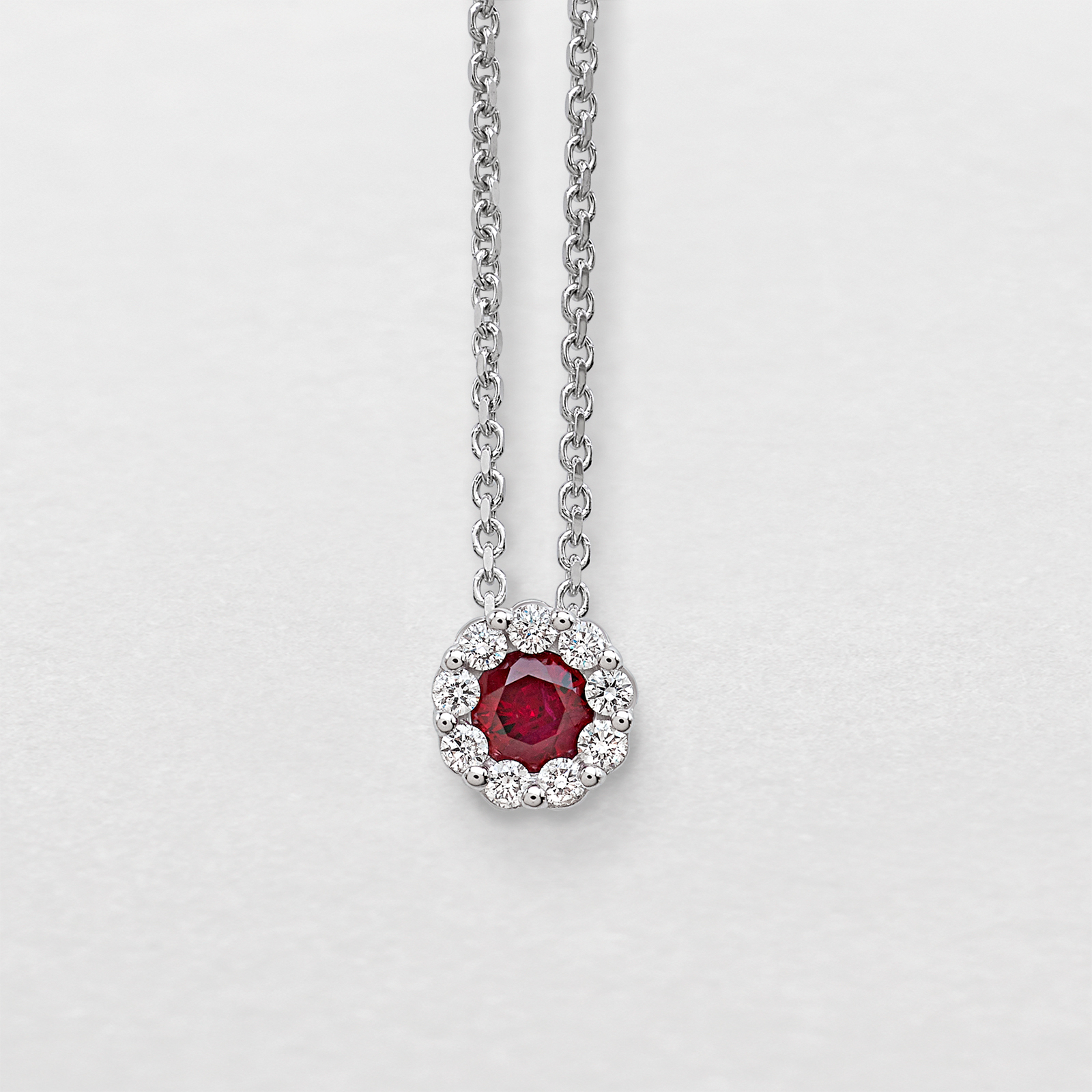 white gold with diamonds and ruby necklace