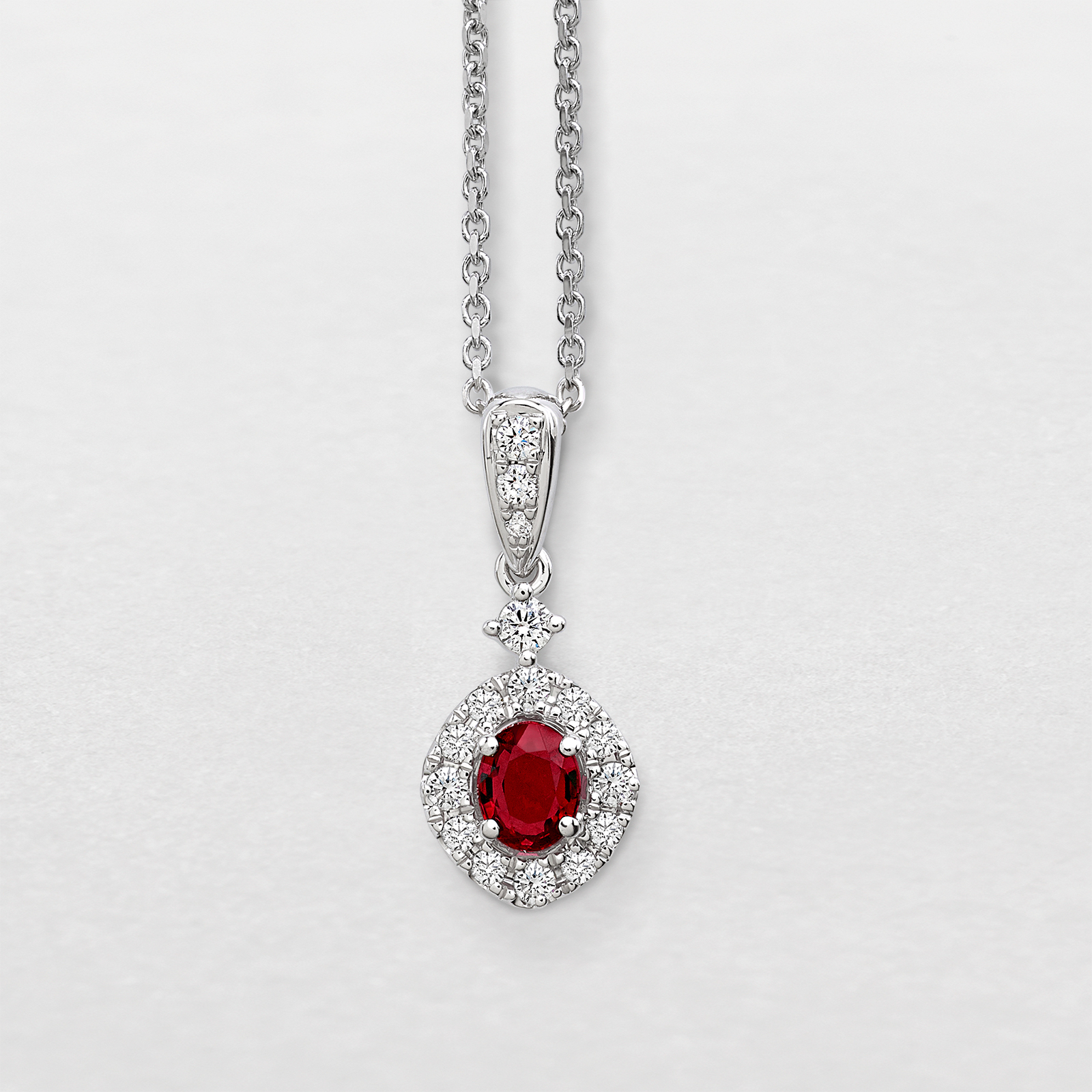 white gold with diamonds and ruby necklace
