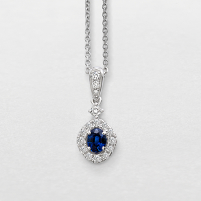 white gold with diamonds and sapphire necklace